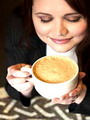 woman drinking coffee